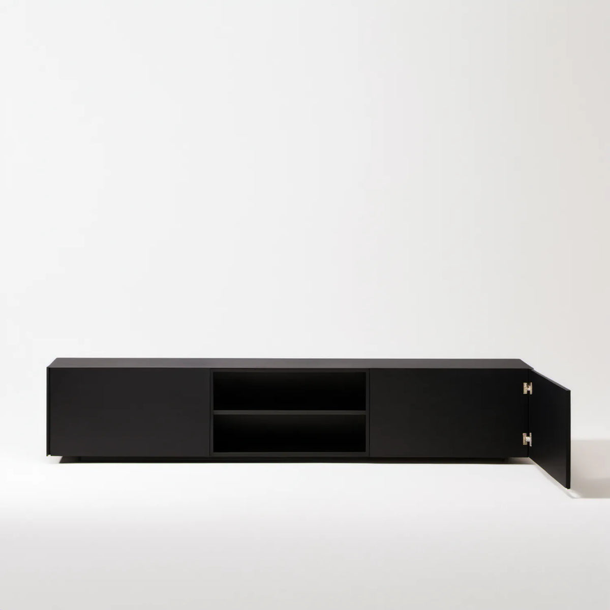 Czarna szafka RTV 180 x 40 x 45 cm z laminowanej płyty wiórowej